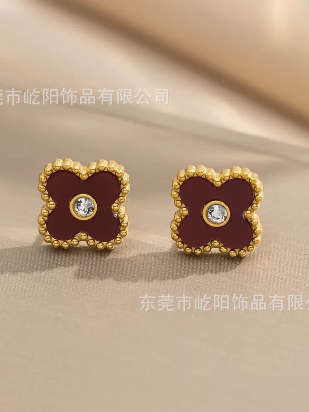 Gold-Tone Burgundy Clover Stud Earrings with Crystal Accent